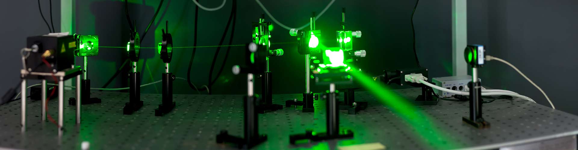 Green laser through glass experiment.