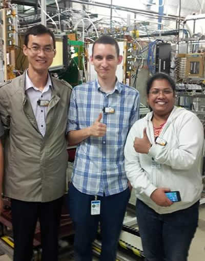 Aiwu, Jessie, and Vallary after installing large GEMs in Fermilab beam