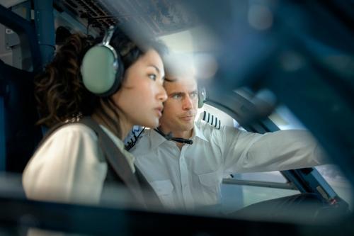 Flight student and instructor in cockpit