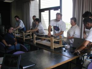QuarkNet participants working together in a lab setting
