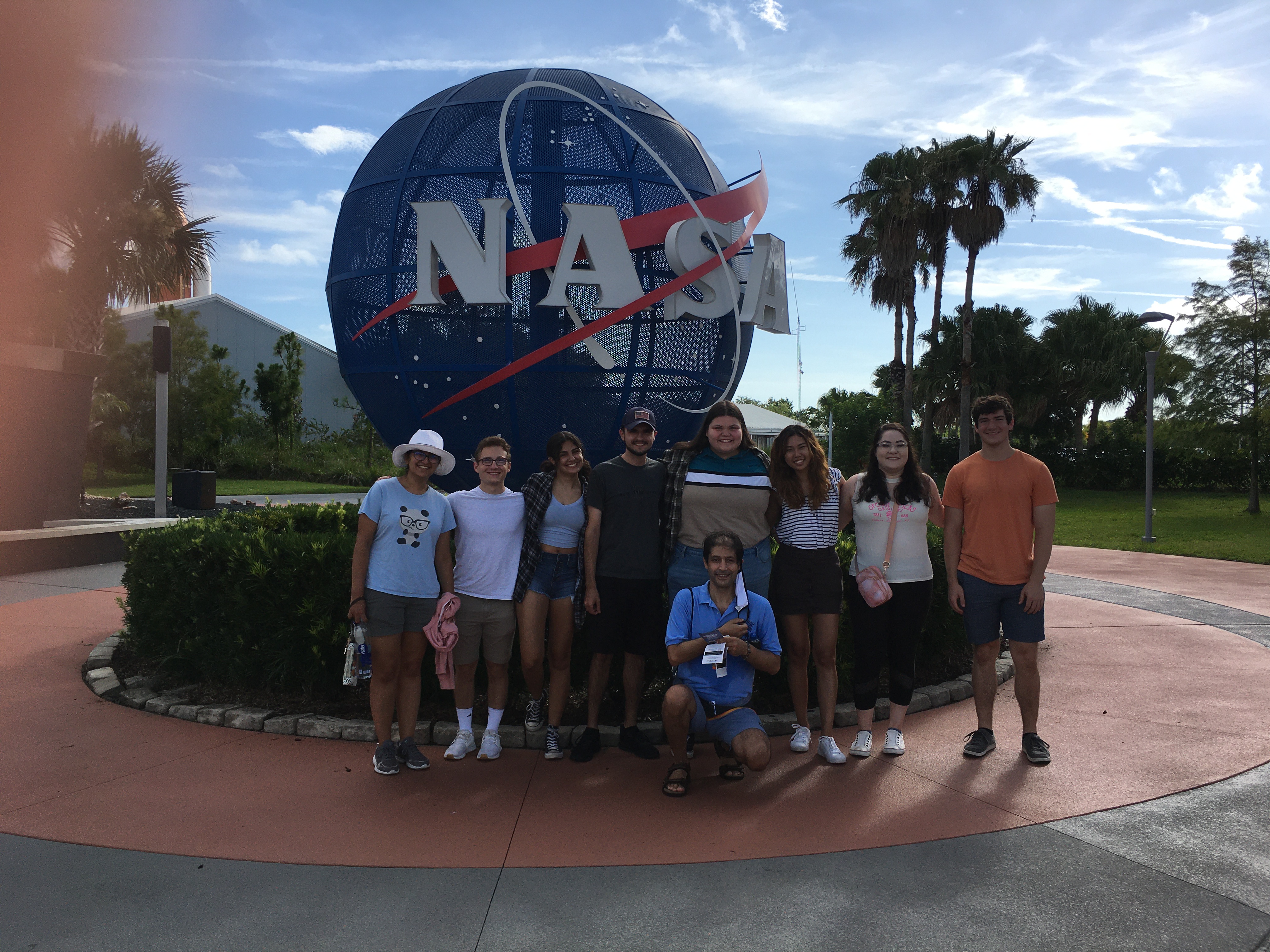Students in front of the NASA sign at Kennedy Space Center