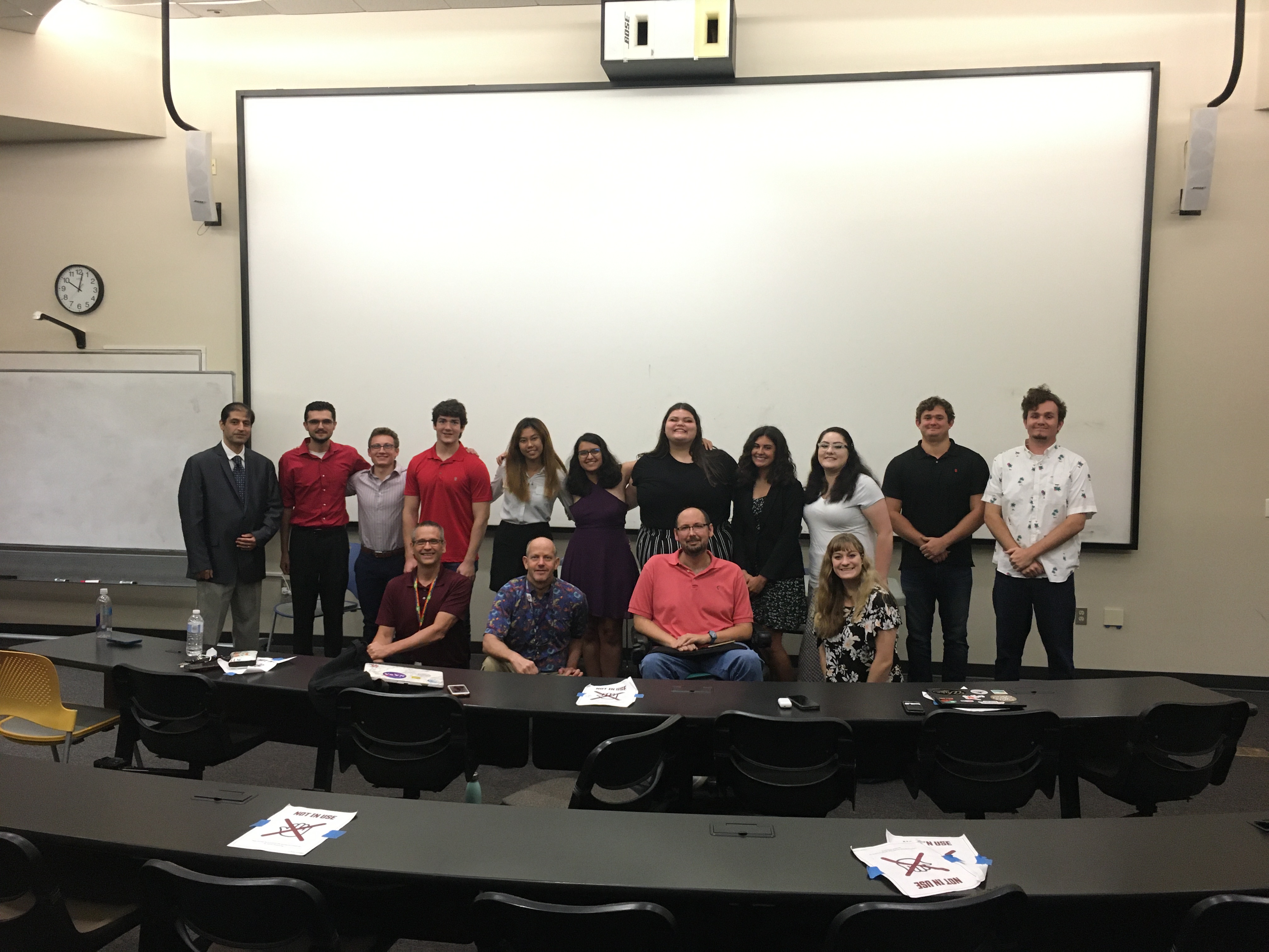 Students and faculty at symposium